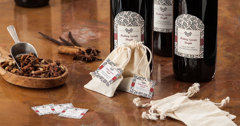 Mulled wine gift set with labeled wine and tagged spice bag