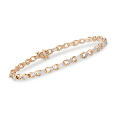 Opal and .10 ct. t.w. Diamond Bracelet in 14kt Yellow Gold. 7" &mdash; Alt Image 1