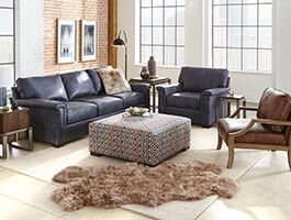 C048 Brown Dual Power Leather Reclining Sofa Art Van Home