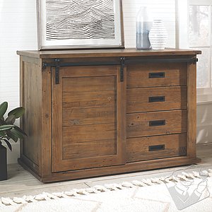 A stunning new furniture piece inspired by out best-selling Mesa Credenza.  Handcrafted from rustic  reclaimed wood  our New Mesa Cabinet offer all the same exceptional details in a smaller size.  The barn style door slides to reveal shelving for the storage and display of glassware and spirits on one side and 4 deep storage drawers on the other side. Shelf easily removes to store a small wine cellar for keeping wine at the perfect temperature close at hand.  Dimensions: 53½'W x 25'D x 36½' Please Note: Does not include wine refrigerator  *Please note:  No two units are exactly the same.  Reclaimed wood may have some small imperfections and holes from the original nails.